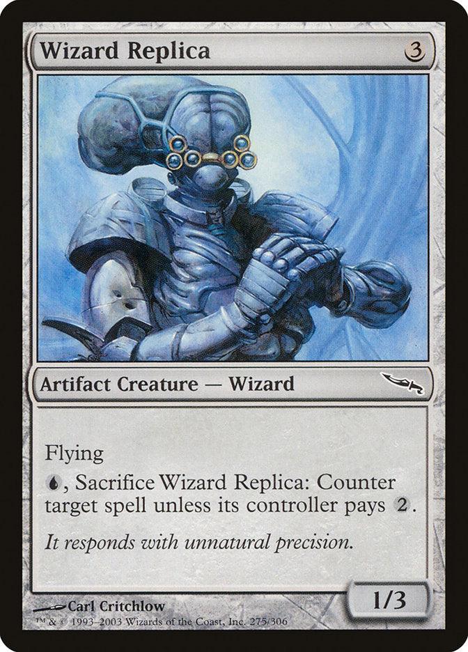 A Magic: The Gathering card titled Wizard Replica [Mirrodin] from the Magic: The Gathering set. It has a mana cost of 3 generic mana. This Artifact Creature - Wizard boasts a power and toughness of 1/3 and features a blue, mechanical wizard-like entity. Abilities include flying and countering target spells by paying 2 mana.