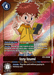 A Digimon trading card featuring Tamer Izzy Izumi [BT4-096] (Buy-A-Box Promo) [Great Legend Promos]. He has spiky brown hair, a yellow shirt, and green shorts, holding a device resembling a laptop. The card's text box includes information about his abilities and effects during gameplay, with a Play Cost of 4 Memory.