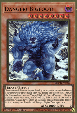A Danger! Bigfoot! (Alternate Art) [MGED-EN018] Gold Rare trading card depicts "Danger! Bigfoot!", a towering blue-furred beast with large claws and a muscular build. The card, from the Yu-Gi-Oh! series, belongs to the "Beast/Effect" category with stats ATK 3000 and DEF 0. Text details the Effect Monster's special abilities.