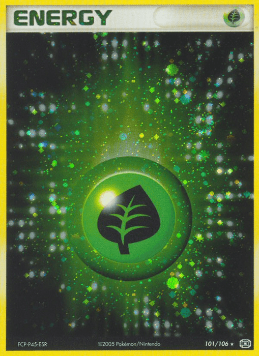 A Pokémon trading card depicts a Grass Energy type. The Holo Rare card features a green circle with a black leaf icon in the center, set against a sparkling background of green and yellow hues. The top reads "ENERGY," and the number "101/106" is in the bottom right corner. It’s from Grass Energy (101/106) [EX: Emerald] by Pokémon.