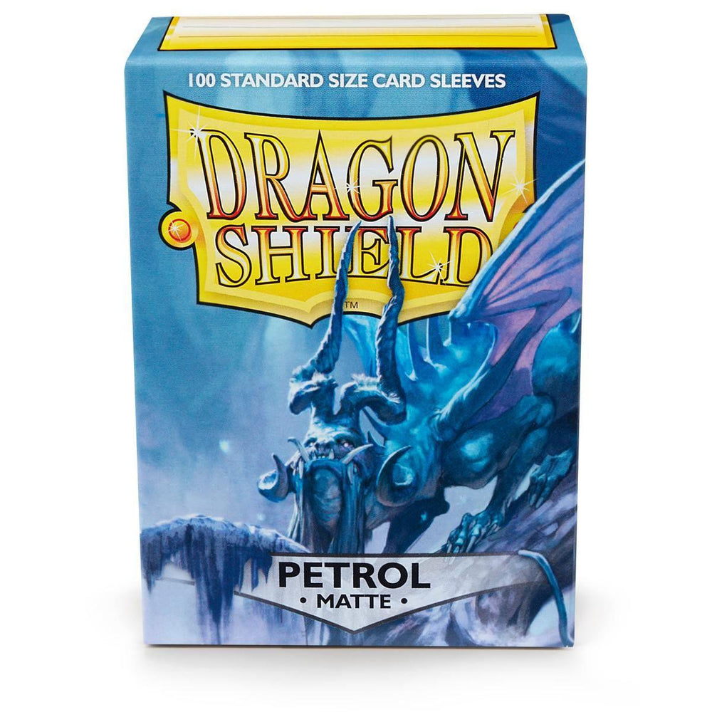 The Arcane Tinmen Dragon Shield: Standard 100ct Sleeves - Petrol (Matte) box features a dragon in blue and purple against a misty backdrop, labeled at the top with “100 Standard Size Matte Sleeves” for protecting your valuables.