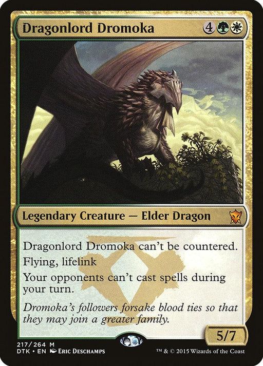 The image shows a Mythic card from the game Magic: The Gathering. It features "Dragonlord Dromoka [Dragons of Tarkir]," a Legendary Creature – Elder Dragon from Magic: The Gathering. The card has a gold border and depicts a large dragon with green wings and brown scales, boasting abilities like flying, lifelink, and spell suppression during your turn.