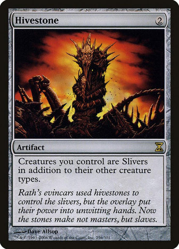 Magic: The Gathering card titled "Hivestone [Time Spiral]." Illustrated is a twisted, dark stone structure with jagged protrusions against a fiery, glowing background. The card reads, "Creatures you control are Slivers in addition to their other creature types." Cost: 2 colorless mana.