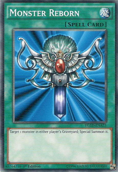 Yu-Gi-Oh! trading card titled "Monster Reborn [YGLD-ENA23] Common" from Yugi's Legendary Decks, a Spell Card. The artwork features an ornate, mystical ankh adorned with a central red gem and intricate metallic wings. Below the ankh, there's a glowing sword. The King of Games can use this card to Special Summon from any graveyard (Code: YGLD-ENA23).