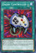 The **Enemy Controller [HAC1-EN025] Common** is a Quick-Play Spell Card from the **Yu-Gi-Oh!** trading card game. This Common Rarity card features an illustration of a game controller with buttons and a control pad, set against a vibrant red-and-purple background. Text below the image outlines the card's effects and usage instructions.