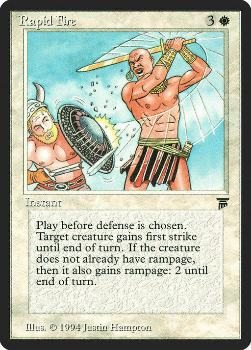 A "Magic: The Gathering" card titled "Rapid Fire [Legends]." This rare Legends card depicts a shirtless, armored man with a sword and shield attacking a surprised bearded man. The instant spell's text box describes its effect, granting first strike and possibly rampage to a target creature until end of turn.