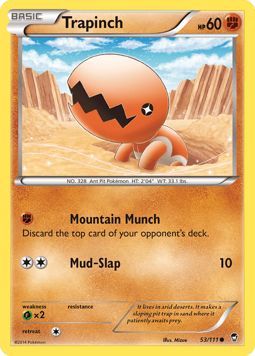 An image of a Pokémon trading card featuring Trapinch (53/111) [XY: Furious Fists] by Pokémon. Trapinch is shown on sandy terrain with a gaping, jagged mouth. The card has 60 HP and includes the moves "Mountain Munch" and "Mud-Slap." Text at the bottom provides Pokédex info stating it lives in arid deserts and builds pitfalls.