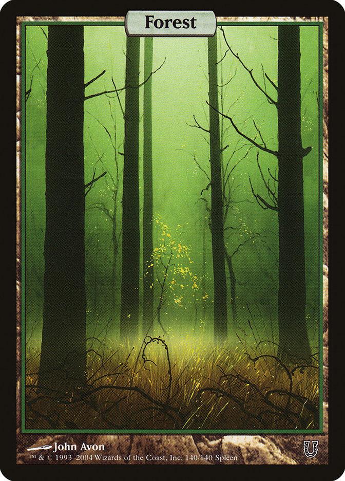 A Magic: The Gathering card named "Forest (140) [Unhinged]" showcases artwork by John Avon. The illustration depicts a serene forest scene with tall, slender trees enveloped in a green, misty atmosphere. The forest floor is lush with grass and foliage, while dappled sunlight filters through the canopy.