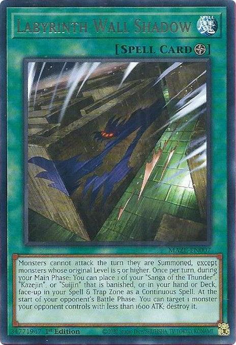 A "Yu-Gi-Oh!" trading card titled "Labyrinth Wall Shadow [MAZE-EN007] Rare". The card, part of the Maze of Memories set, has a green border indicating it is a Field Spell card. The illustration depicts a maze with a winged shadowy figure in the center. Text describes the card's abilities and restrictions, noting it is a 1st Edition Rare.
