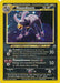 A Pokémon trading card featuring Houndoom (4/75) [Neo Discovery Unlimited], a dark-type Pokémon from the Neo Discovery Unlimited set. The Holo Rare card has 70 HP and includes the text "Evolves from Houndour." Houndoom is depicted as a dark, canine-like creature with curved horns, glowing eyes, and a spiked collar. The card details two attacks: Crunch and Flamethrower.