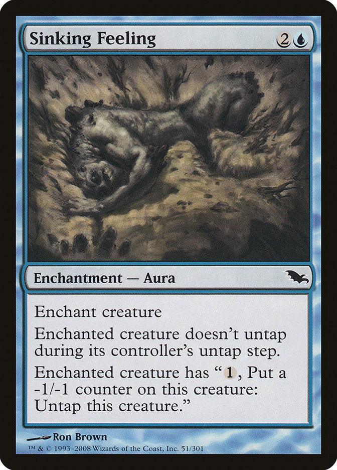 The Magic: The Gathering product Sinking Feeling [Shadowmoor] is an Enchantment - Aura from the Shadowmoor set. The illustration depicts a creature trapped in a murky, ground-like substance. Text reads: 