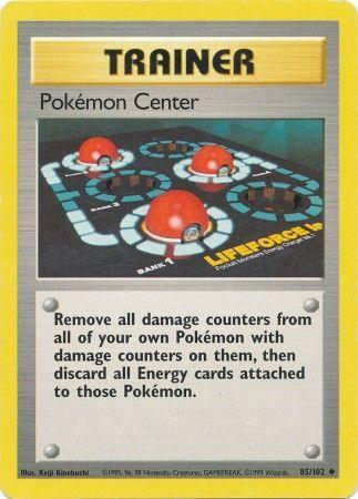 A Pokémon trading card titled **Pokemon Center (85/102) [Base Set Unlimited]**. The illustration shows a hall with four healing stations and Poké Balls on them. This Uncommon card from the Base Set Unlimited removes all damage counters from your Pokémon, then discards all attached Energy cards. Numbered 85/102, illustrated by Kenji Kinebuchi.

