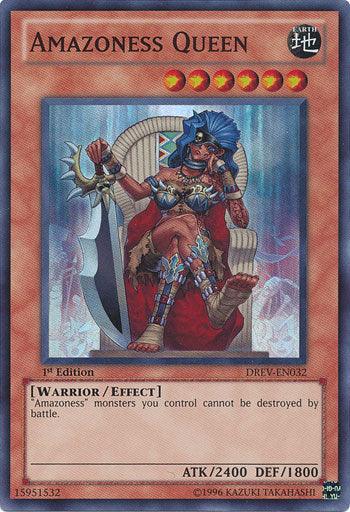 Image of the Yu-Gi-Oh! trading card "Amazoness Queen [DREV-EN032] Super Rare" from Duelist Revolution. The card showcases an armored female warrior with dark hair, holding a large sword and sitting on a throne. As an Earth attribute Effect Monster with 2400 ATK and 1800 DEF, it prevents Amazoness monsters you control from being destroyed in battle.