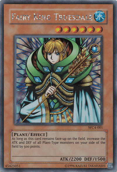 A Super Rare Yu-Gi-Oh! trading card, "Fairy King Truesdale [WC4-001]," features a regal figure with blonde hair in green and gold armor adorned with leaves. As a Level 6 Effect Monster, it enhances Plant-type monsters' ATK and DEF by 500, boasts an Attack of 2200 and Defense of 1500, and was featured in the World Championship 2004.