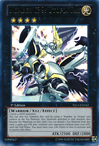 A Yu-Gi-Oh! trading card named "Number C39: Utopia Ray [YS13-EN042] Ultra Rare" featuring a robotic warrior in white and gold armor, dual wings, and a blue cape. The character wields a glowing sword. This Ultra Rare Xyz/Effect Monster has 2500 ATK, 2000 DEF and ID: YS13-EN042.