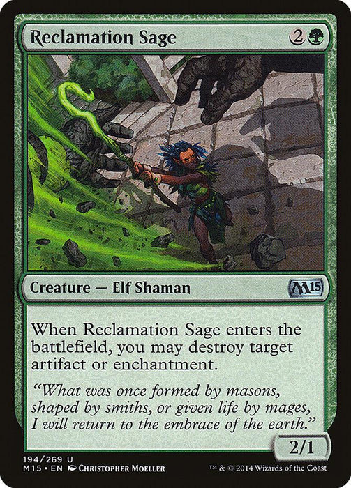 A Magic: The Gathering card titled Reclamation Sage [Magic 2015] from the Magic 2015 set has green borders. It features an Elf Shaman wielding a glowing green staff, casting a spell that shatters a stone wall. Costing 2 colorless and 1 green mana, it has power/toughness 2/1 and can destroy an artifact or enchantment upon entering the battlefield.