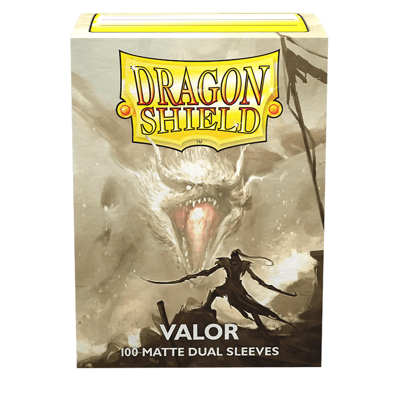 The image depicts a box of "Dragon Shield: Standard 100ct Sleeves - Valor (Dual Matte)" from Arcane Tinmen, featuring artwork of a warrior with a shield and spear facing a roaring dragon. The packaging text reads "DRAGON SHIELD" at the top and "VALOR 100-MATTE DUAL SLEEVES" at the bottom. These fully opaque Dual Matte sleeves boast a black interior against a grayscale, dynamic background.