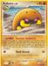 The image shows a Pokémon trading card from the Pokémon brand for Kabuto (67/100) [Diamond & Pearl: Majestic Dawn]. Kabuto is depicted as a yellow, dome-shaped creature with red eyes peeking out from beneath its shell. The card details include Kabuto's level (38), HP (80), type (Rock), and moves: Ancient Guidance (Poké-POWER) and Shell Attack. Text and game stats fill the rest of the card.