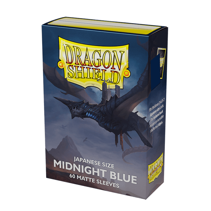 A box of Arcane Tinmen Dragon Shield: Japanese Size 60ct Sleeves - Midnight Blue (Matte) featuring a blue dragon flying over a misty landscape. The box, marked as "Japanese Size," contains 60 matte sleeves ideal for TCGs and is labeled "Midnight Blue." The Dragon Shield logo is prominently displayed at the top.