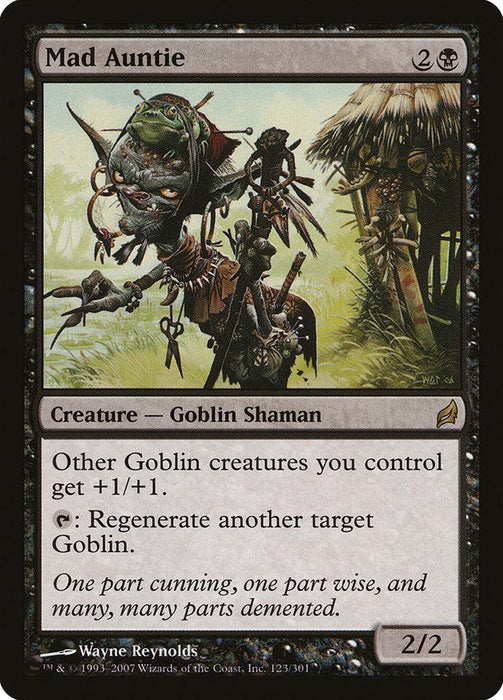 The image showcases the "Mad Auntie [Lorwyn]" Magic: The Gathering card. This rare creature costs 2 colorless and 1 black mana. It's a Goblin Shaman, giving +1/+1 to other goblins and can regenerate another target Goblin. The flavor text reads, "One part cunning, one part wise, and many, many parts demented.