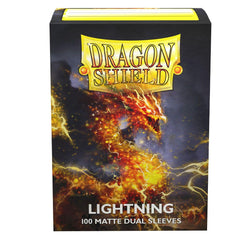 The image shows a box of Dragon Shield: Standard 100ct Sleeves - Lightning (Dual Matte) from Arcane Tinmen, featuring artwork of orange and yellow lightning on a dark background. The box is labeled "LIGHTNING" and contains 100 opaque sleeves for optimal card protection. The Dragon Shield logo is prominently displayed at the top.