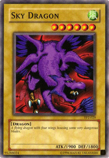 The "Yu-Gi-Oh!" trading card, Sky Dragon [TP2-029] Common, features a ferocious, purple dragon with sharp claws and fangs soaring against a red background. This Common Normal Monster has stats of ATK 1900 and DEF 1800, and is renowned for its dangerous blades. Illustration © 1996 Kazuki Takahashi.