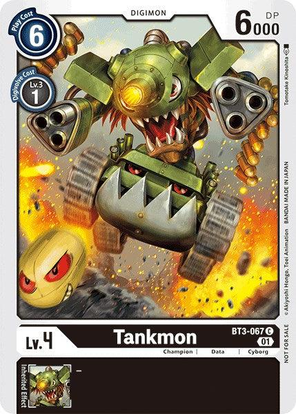 The Digimon trading card "Tankmon [BT3-067] (Tamer Party Vol. 4) [Release Special Booster Promos]" features a cyborg Digimon with a tank body, green upper body, sharp teeth, and red eyes, launching a fiery projectile. The card includes details like play cost, level, DP, and other game-specific attributes. Additionally, there is a small image of another Digimon in the bottom corner.