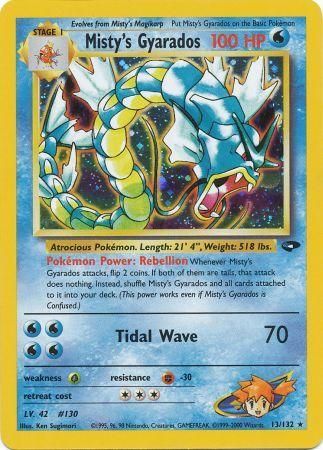 This Pokémon Holo Rare card, Misty's Gyarados (13/132) from the Gym Challenge Unlimited series, features a Water type Pokémon with 100 HP. It showcases the "Rebellion" ability and a "Tidal Wave" attack that deals 70 damage. Additional details include weight, height, the artist's name, and a small image of Misty in the corner.