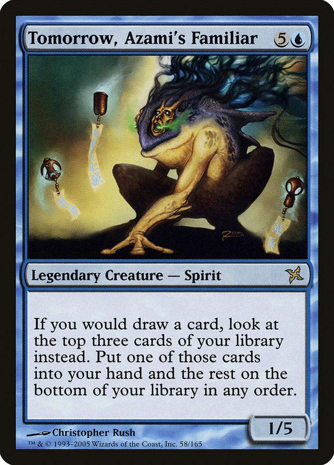 The "Tomorrow, Azami's Familiar" card from Magic: The Gathering's Betrayers of Kamigawa series exhibits a blue-bordered design and features a Legendary Creature that blends human and frog elements while balancing on a tree branch. The card’s text details an ability associated with drawing cards, with artwork by Christopher Rush.