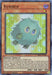 A trading card featuring Kuribeh [BROL-EN004] Ultra Rare from the Yu-Gi-Oh! series. Kuribeh is a small, fluffy, green creature with large, blue eyes and tiny limbs. This Ultra Rare DARK attribute Effect Monster boasts 300 ATK and 200 DEF. The card includes detailed game text and hails from the BROL set with ID BROL-EN004.