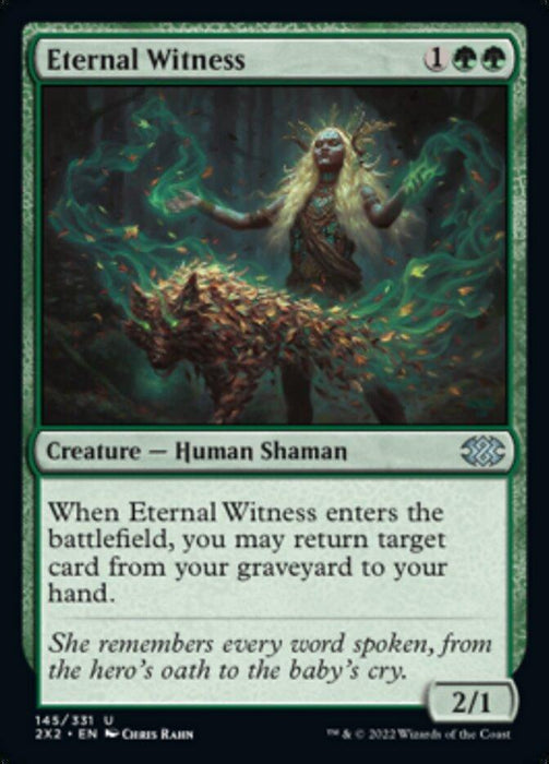 The Eternal Witness [Double Masters 2022] card from Magic: The Gathering features a green-haired, mystical Human Shaman surrounded by ethereal, green energy and a ghostly, transparent wolf. This creature card has a power and toughness of 2/1 and boasts the ability to return a card from the graveyard.