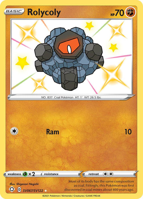 Rolycoly (SV067/SV122) [Sword & Shield: Shining Fates] by Pokémon: A Basic, Rock/Fighting-type creature with 70 HP from the Shining Fates set. It has an ability called Ram, dealing 10 damage. The illustration depicts a rock with a glowing orange core against a background with yellow and white sparkling effects. Weakness to water, retreat cost of one energy. Ultra Rare card number: SV067/SV122