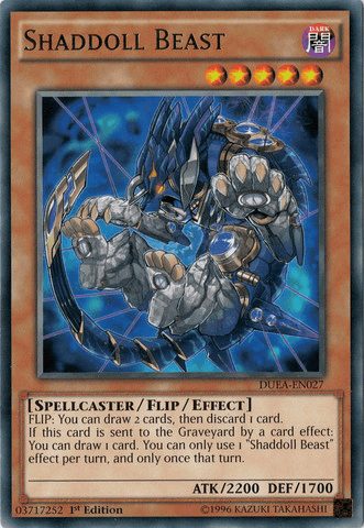 A Yu-Gi-Oh! card named "Shaddoll Beast [DUEA-EN027] Rare," a Flip/Effect Monster from the Duelist Alliance set. It showcases a beastly figure with metallic armor and glowing elements. The brown-bordered card lists attributes, including ATK/2200 and DEF/1700, and features detailed effects and abilities in its description box.