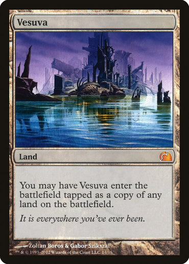 The Magic: The Gathering card "Vesuva [From the Vault: Realms]" showcases artwork depicting a reflective water surface in a shattered landscape beneath a dark, cloudy sky. This mythic land card has the unique ability to enter the battlefield tapped as a copy of any land in play.