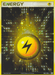 A Pokémon trading card depicting a Lightning Energy (104/106) [EX: Emerald] card. The card features a glowing yellow circle with a black lightning bolt icon in the center. The background is filled with sparkling, star-like effects radiating outward. The top of the card reads "ENERGY" in bold letters from the EX: Emerald series.