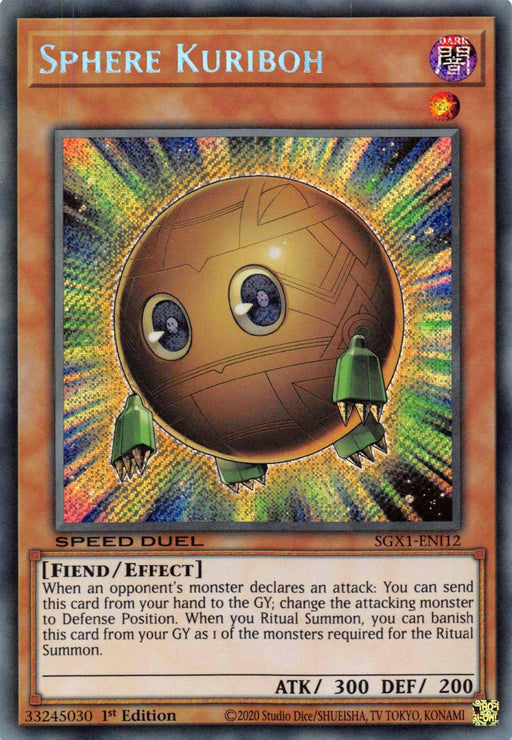 Image of a Yu-Gi-Oh! trading card titled "Sphere Kuriboh [SGX1-ENI12] Secret Rare." This Secret Rare Effect Monster depicts a round, brown, Kuriboh-like creature with small green hands and feet, and large, expressive eyes. The background features a burst of colorful light. The card's attributes, effects, and other details are displayed.