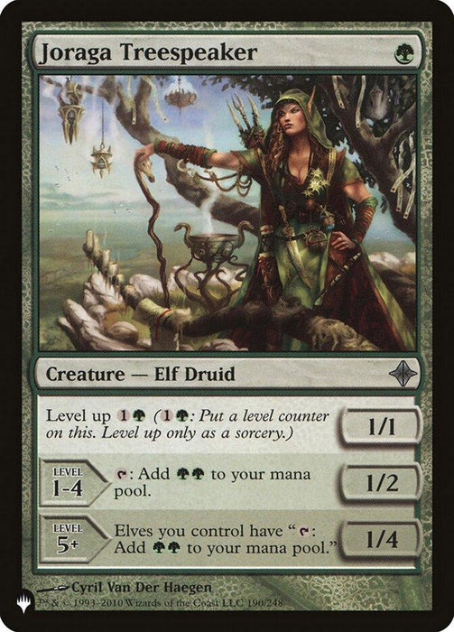 A Magic: The Gathering card named "Joraga Treespeaker [The List]." The card is green and features a female Elf Druid casting a spell on a rocky outcrop with mushrooms. The creature is a 1/1 with level-up abilities, increasing her mana and power as she gains levels. Illustrated by Cyril Van Der Haegen.