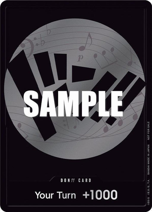 A black trading card from the **Bandai** **DON!! Card (Silver) [One Piece Promotion Cards]** series features a large silver circle in the center, adorned with various musical symbols and several black striped designs. The word "SAMPLE" is prominently displayed in white across the center. At the bottom, white text reads "Your Turn +1000." The bottom left corner says "DON!! CARD.
