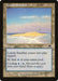 The Magic: The Gathering product "Lonely Sandbar [Onslaught]" showcases a quiet, isolated sandbar with a seagull flying above. This "Land" enters the battlefield tapped, can be tapped for one blue mana, and features the Cycling ability for one blue mana. Art by Heather Hudson.