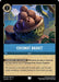 A trading card depicting a basket filled with versatile coconuts. The basket is placed on a stone surface, with a scenic background featuring blue water, mountains, and foliage. Text on the card reads, "Coconut Basket (166/204) [The First Chapter]" and describes its item effect within the game to remove damage. Decorative borders adorn the edges. This product is brought to you by Disney.