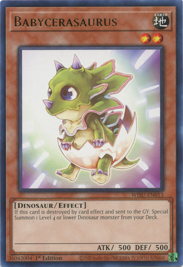 The Yu-Gi-Oh! trading card Babycerasaurus [WISU-EN013] Rare showcases a cartoonish, green baby dinosaur breaking out of an egg. As a Rare Effect Monster, it boasts large, round eyes and a playful expression, with its claws visible and several small spikes protruding from its head and back. The card details include the dinosaur's name, attack and defense points, and special effects.