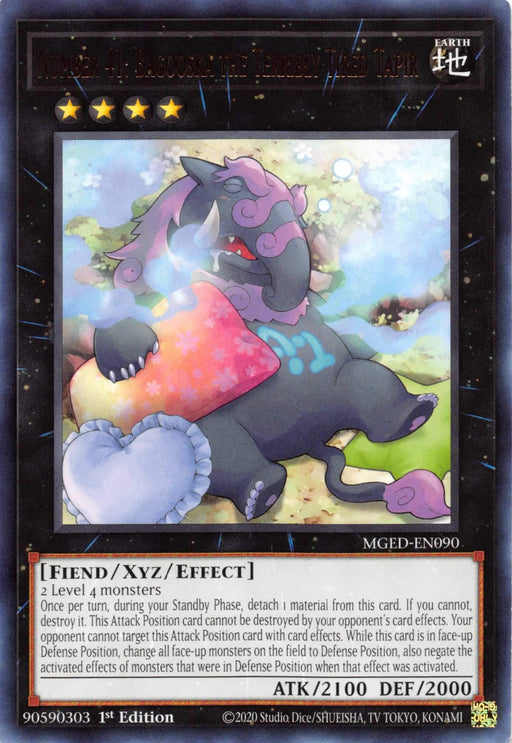An image of a Yu-Gi-Oh! trading card: "Number 41: Bagooska the Terribly Tired Tapir [MGED-EN090] Rare." The card features a sleepy, colorful tapir-like creature surrounded by a magical aura with energy swirls. This Rare card from Maximum Gold: El Dorado has stars (4) and stats of ATK 2100 and DEF 2000.
