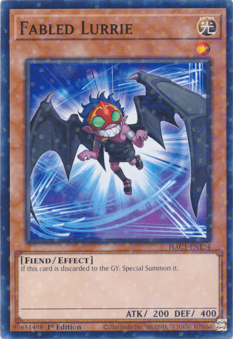 The image shows the "Fabled Lurrie (Duel Terminal) [HAC1-EN124] Common" Yu-Gi-Oh! trading card. This Effect Monster features a small, winged creature with spiky hair, a colorful eye mask, and purple clothing. It can special summon itself when discarded to the Graveyard and has 200 ATK and 400 DEF.