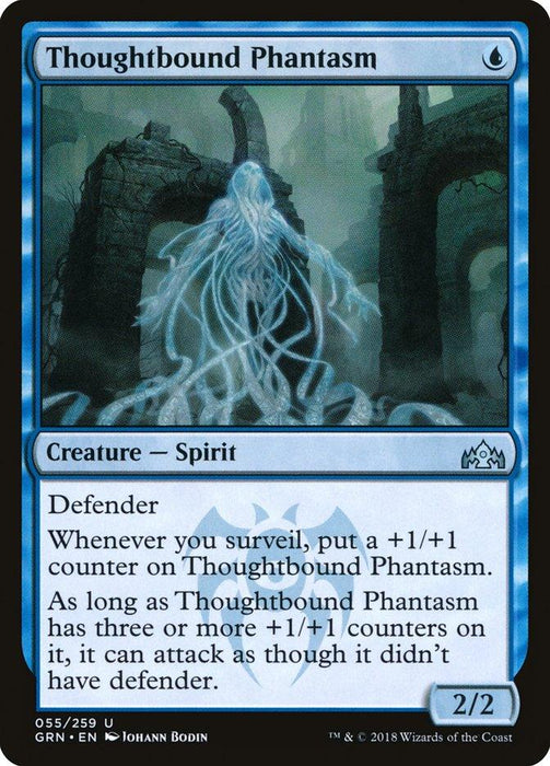 The image shows a Magic: The Gathering card from the Guilds of Ravnica set named "Thoughtbound Phantasm [Guilds of Ravnica]." It features a spectral creature amidst ancient ruins. The blue card attributes include "Creature — Spirit" gaining +1/+1 when surveilled and losing defender at three or more +1/+1 counters. It's a 2/2 creature, produced by Magic: The Gathering.