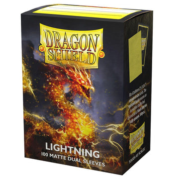 A yellow and black cardboard box prominently displays "Dragon Shield" in bold yellow letters on the front. Beneath this, "Lightning" and "Standard 100ct Sleeves - Dual Matte" are written. The box showcases an image of a powerful lightning strike amidst dark clouds, emphasizing the card protection offered by these opaque sleeves from Arcane Tinmen's Dragon Shield line.