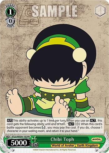 The Chibi Toph [Avatar: The Last Airbender] trading card by Bushiroad features Toph Beifong seated cross-legged with her eyes closed, dressed in a green and yellow Earth Kingdom outfit and headband. This promotional card boasts game stats, including a 5000 attack power, with abilities detailed below her image.