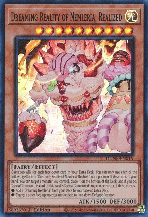 A Yu-Gi-Oh! trading card titled "Dreaming Reality of Nemleria, Realized [DUNE-EN015] Super Rare" from the Duelist Nexus set. This Effect Monster features a dragon-like creature with multiple eyes and a red and white scaly body, surrounded by various abstract shapes and colors. The card text and stats (ATK 1500, DEF 3000) are visible at the bottom.