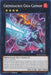 A Yu-Gi-Oh! trading card titled "Grenosaurus Giga-Cannon [DUNE-EN046]" from the Duelist Nexus. The card features a mechanical dinosaur-like Xyz/Effect Monster with glowing energy and cannons. It has 2200 ATK and 2000 DEF, set against a dark background with blue and orange energy flashes. Rarity symbol: Common.