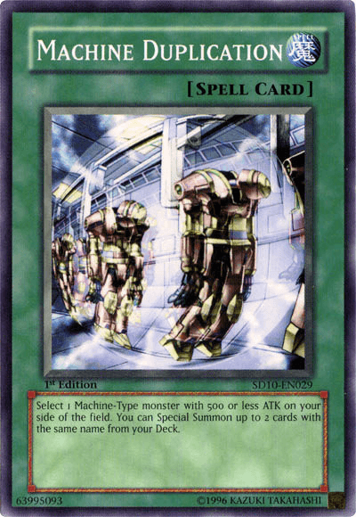 A Yu-Gi-Oh! trading card titled "Machine Duplication [SD10-EN029] Common" is categorized as a Normal Spell. The card features an illustration of three robots standing in a futuristic corridor with bright lights. Part of the Machine Re-Volt Structure Deck, it details an effect that involves summoning Machine-Type monsters.