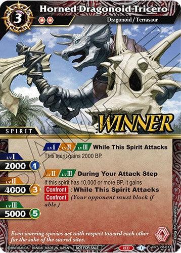 A trading card featuring the "Horned Dragonoid Tricero (Winner) (PR-011)," a dragon-like creature with large horns and armor. Part of the Bandai Battle Spirits Saga Promo Cards, it has stats and abilities with colorful icons on the left. A "WINNER" label is prominent in the middle. The bottom reads, "Even warring species act with respect toward each other for the sake of the sacred lands.